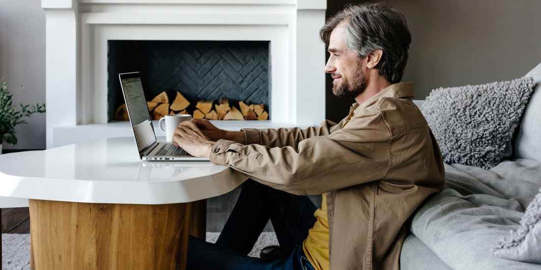 Man typing on a computer.
