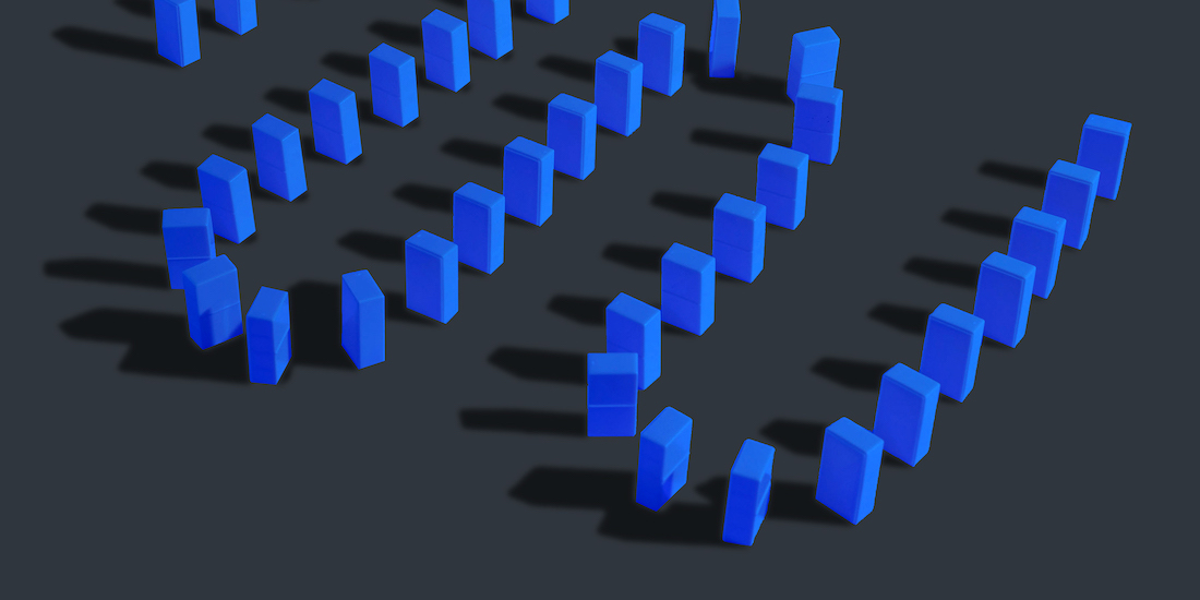 dominoes lined up to fall
