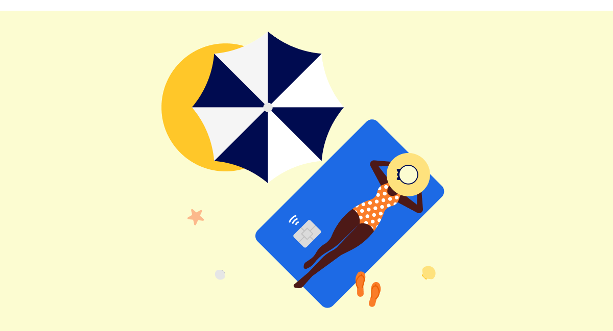 Person laying on debit card beach towel