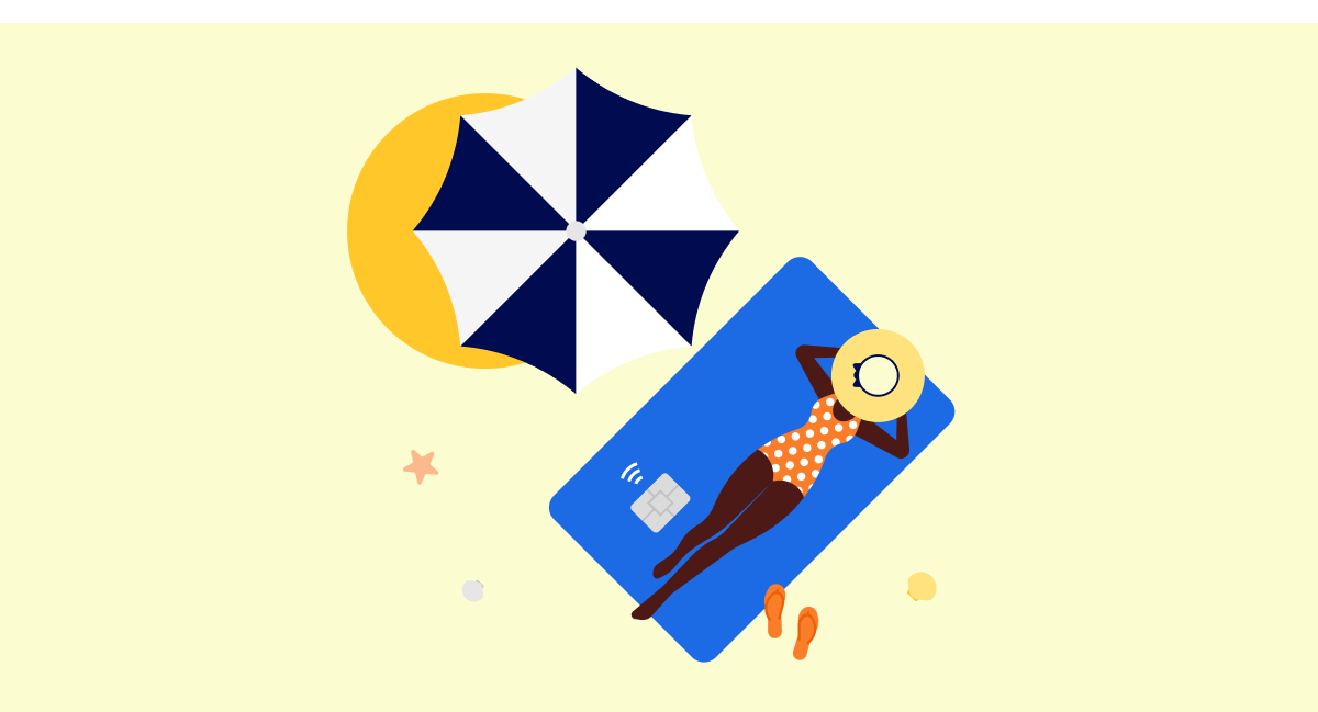 person laying on debit card shaped beach towel