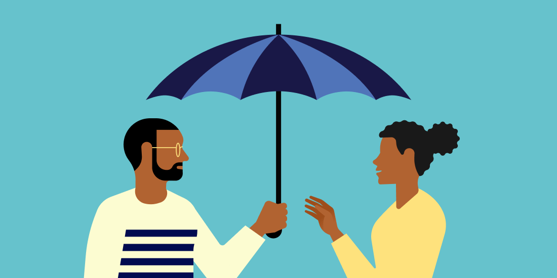 Two people under umbrella