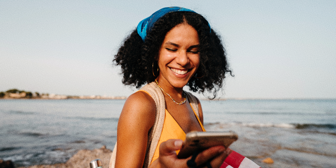 Woman looking at a tablet. 