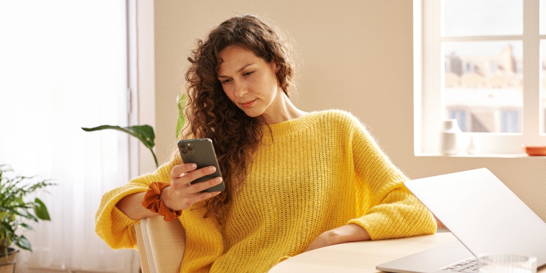 Woman reading something on her phone.