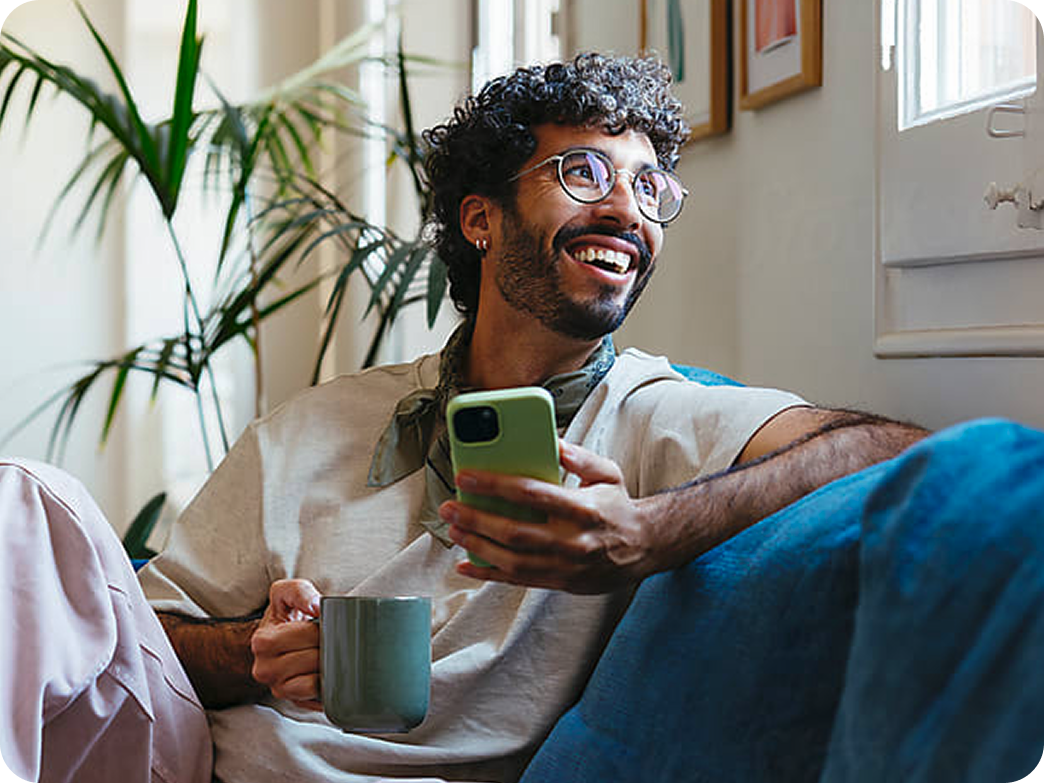 Smiling person near window